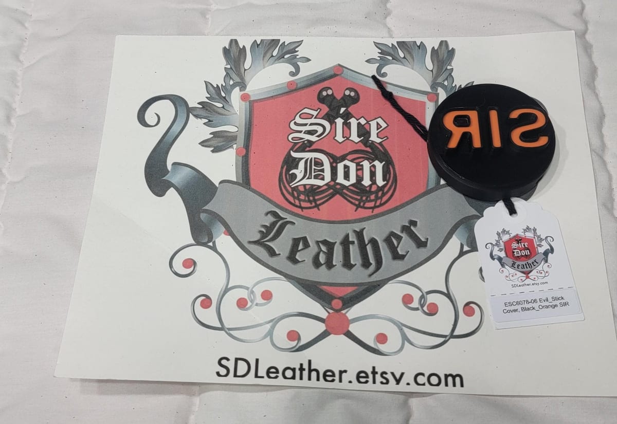 Evil_Stick Cover, Black_Orange  SIR---Mature Content — photograph 1