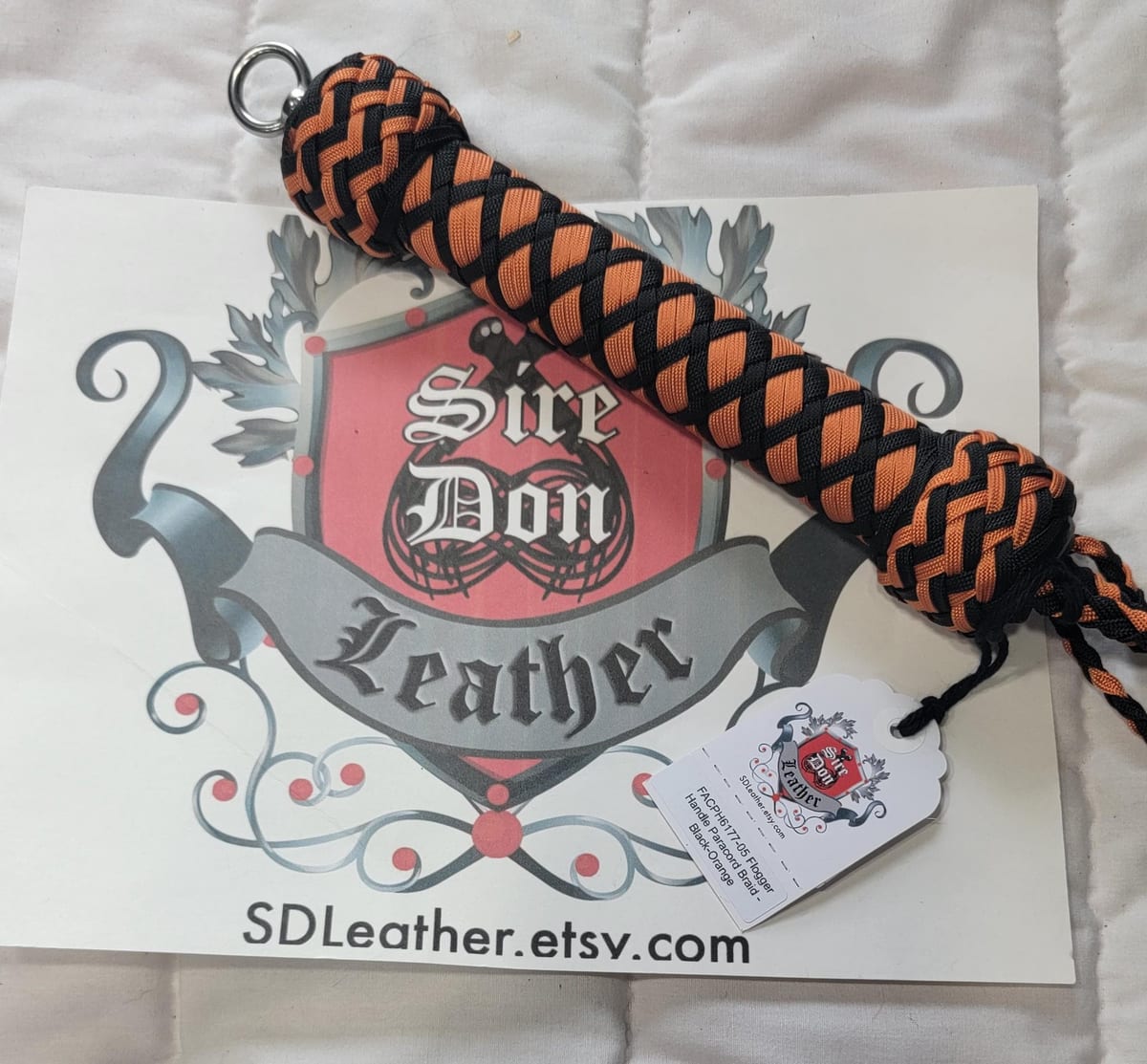 Flogger Handle Paracord Braid - Black-Orange — photograph 1