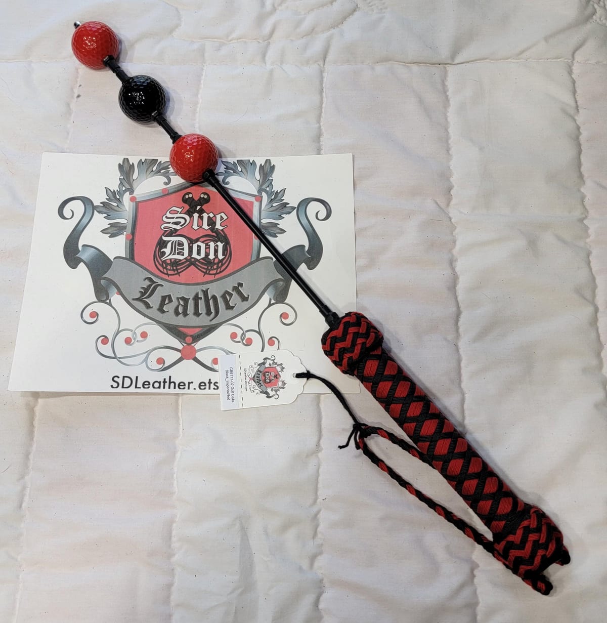 Golf Balls Black_ImperialRed — photograph 1