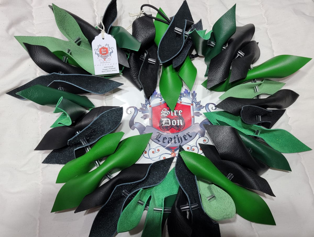 Flogger_PinWheel Black_Mixed_Greens — photograph 1
