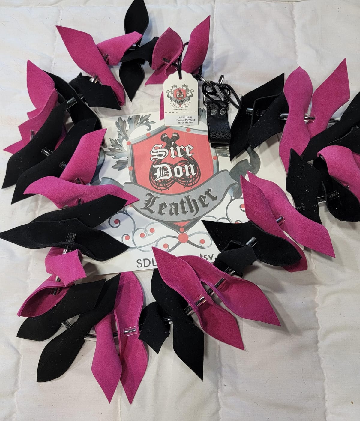 Flogger_PinWheel Black_HotPink — photograph 1