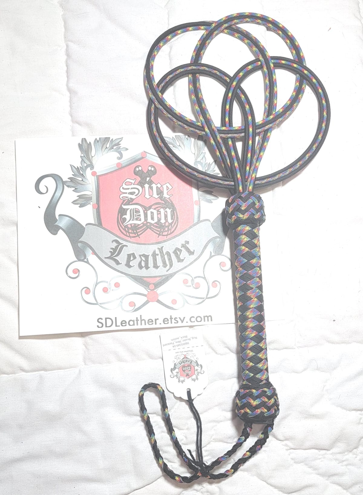 Rug_Beater_Wire_Paracord Black_autism — photograph 1