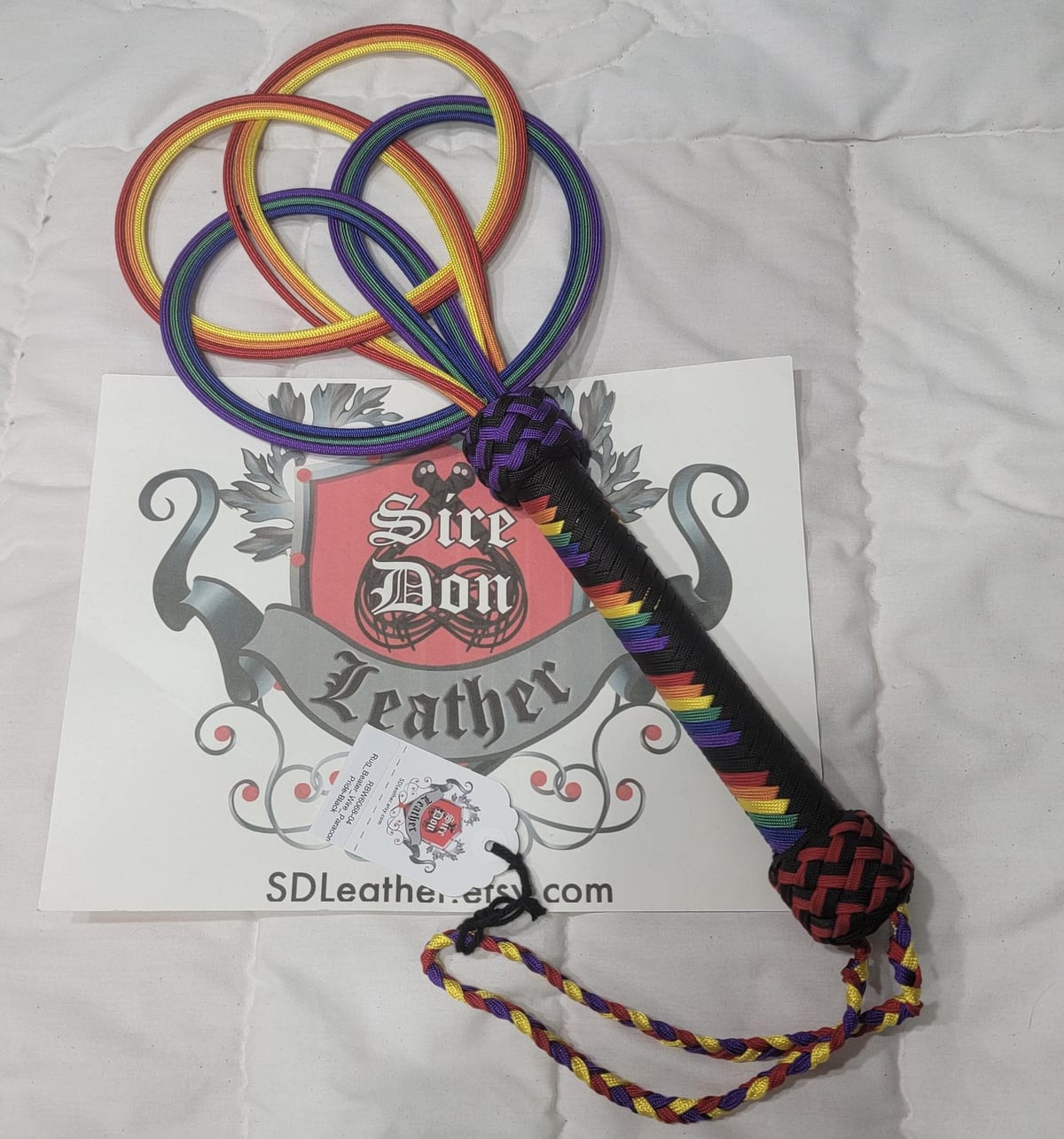 Rug_Beater_Wire_Paracord Pride-Black — photograph 1