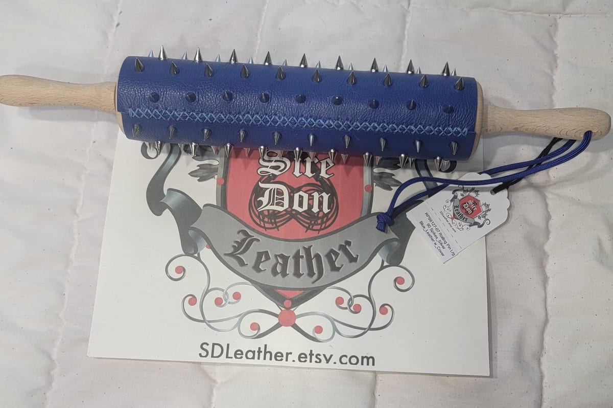 Rolling Pin Lrg 90 Spikes_Silver Blue_Leather w_Cover — photograph 1