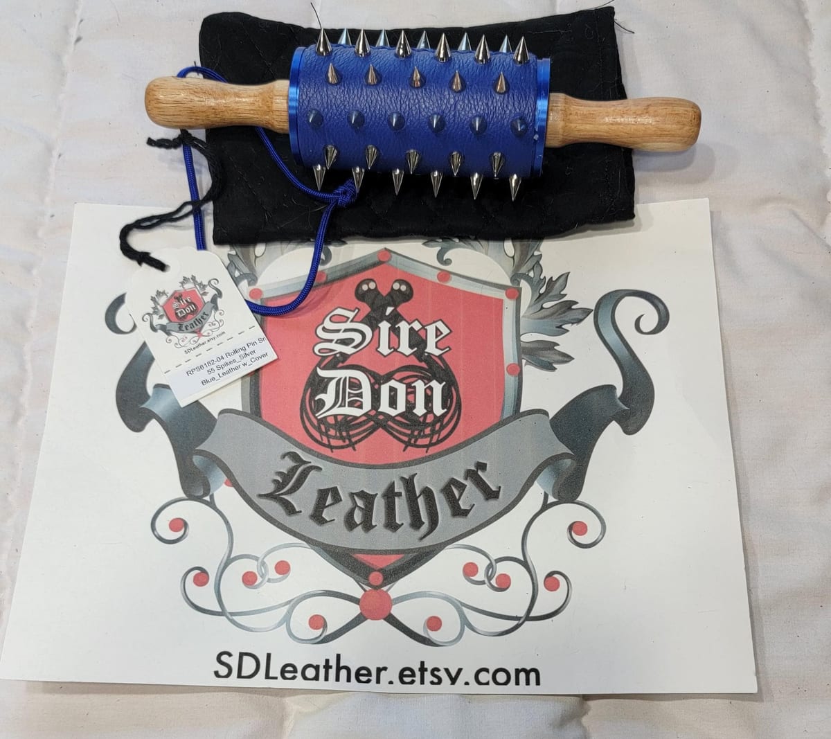 Rolling Pin Sml 55 Spikes_Silver Blue_Leather w_Cover — photograph 1