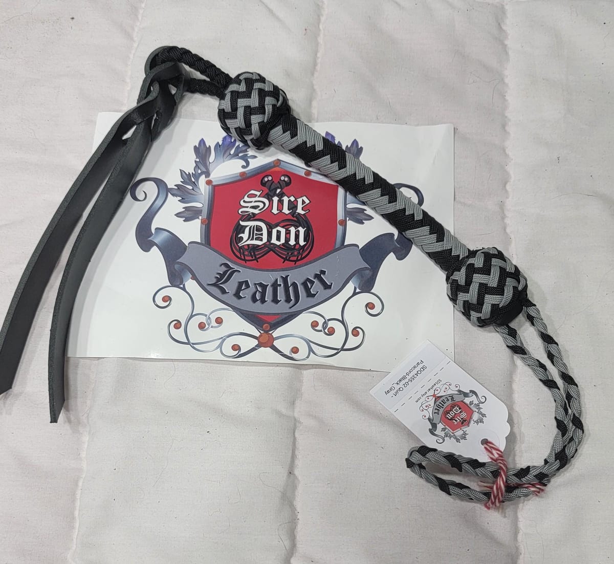Quirt - Paracord-Black_Gray ---Mature Content — photograph 1